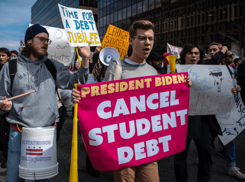 People march against student debt around the U.S. Department of Education in Washington, D.C. on April 4, 2022. Members of the Debt Collective, which describes itself as a borrowers' union, called for President Joe Biden to abolish all student loan debt by executive order.