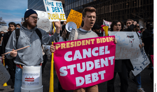 People march against student debt around the U.S. Department of Education in Washington, D.C. on April 4, 2022. Members of the Debt Collective, which describes itself as a borrowers' union, called for President Joe Biden to abolish all student loan debt by executive order.