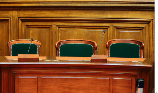 Photo illustrating empty seats in a government building