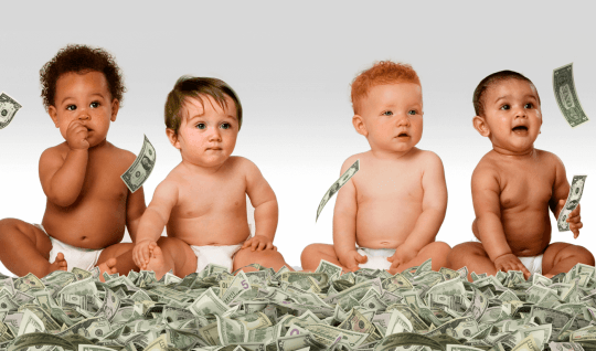 Infants sitting on a pile of money