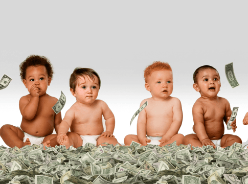 Infants sitting on a pile of money