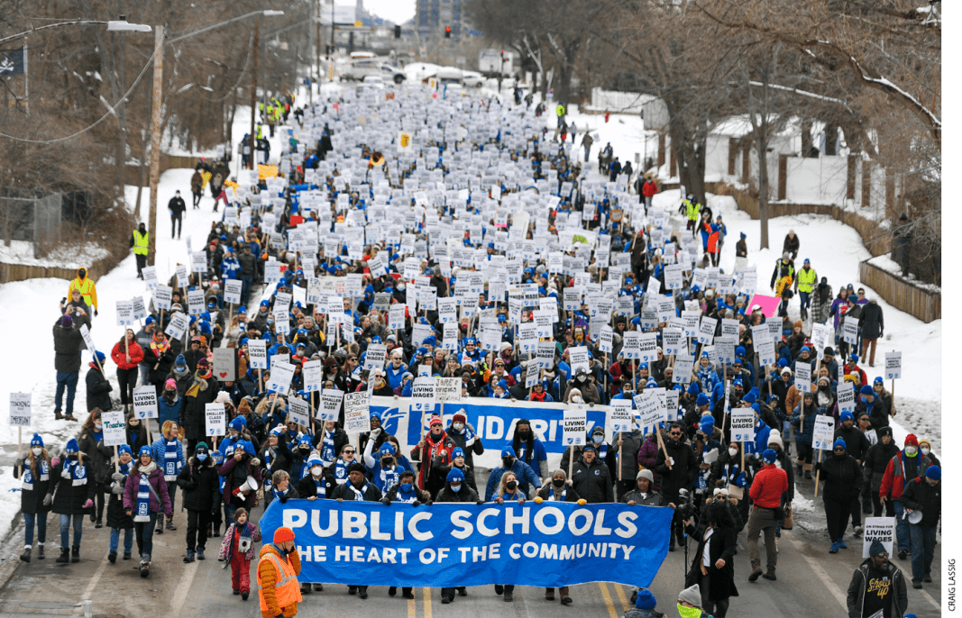Teachers and supporters march from the MPS Nutrition Center to the John B. Davis Education Service Center during a rally in the first day of the teachers strike Tuesday, March 8, 2022. This is the city district's first teachers strike since 1970.