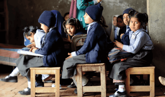 Schoolchildren at a private school in Punjab Province listen to a lesson.